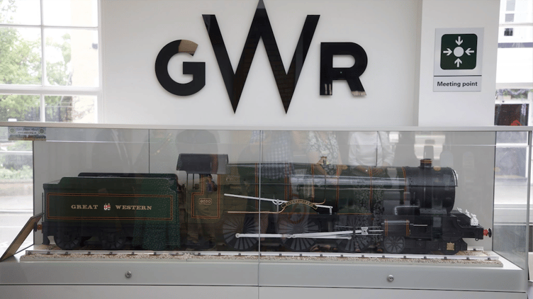 A model locomotive made by West Somerset Railway Association volunteer Clive Goddard now displayed at Taunton Station, where he began a career on the railways in 1949.
