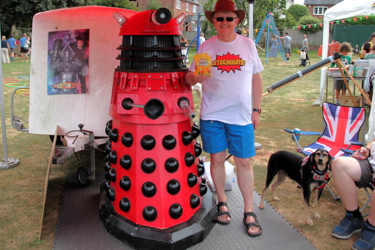 A Dalek (left!) meets Clive Longhurst at Roadwater Fete. PHOTO: George Ody.