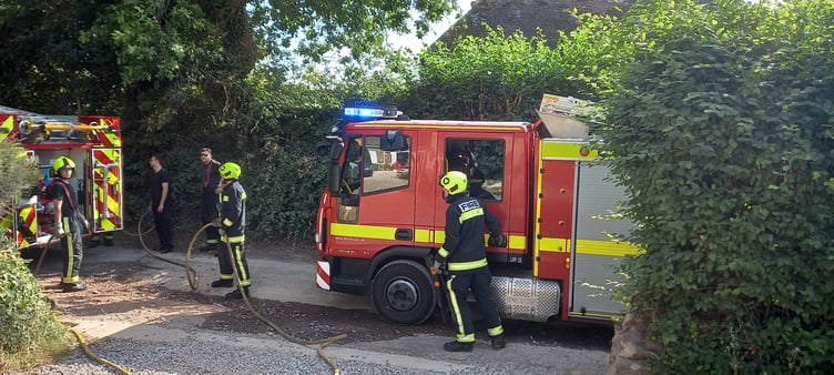 Minehead firefighters who tackled a garden fire in Blue Anchor and prevented it spreading to woodland.