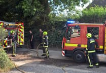 Woodland fire averted as neighbours spot back garden alight in tinder dry conditions