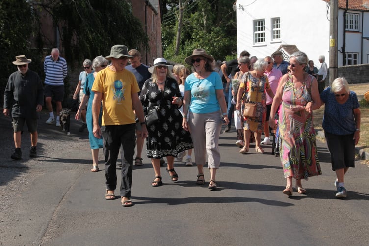 Many residents in Kilve turned out to walk to the home of the village's oldest resident, centenarian Grace Thorne, to sing 'Happy Birthday'. PHOTO: George Ody.