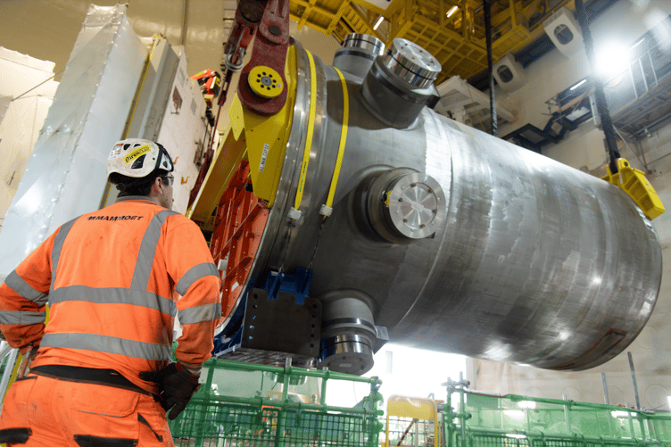 Hinkley Point C's second nuclear reactor being lowered into place.