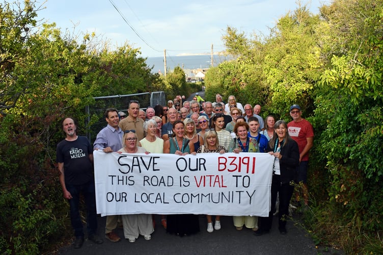 Residents and councillors attend a rally to support the reopening of the B3191 Watchet to Blue Anchor road.