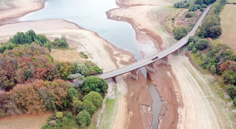 A done image looking down on Bessom Bridge crossing an increasingly depleted Wimbleball Reservoir. PHOTO: Paul Silvers/Cloud9weather.