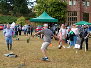 Singing in the rain at church fete