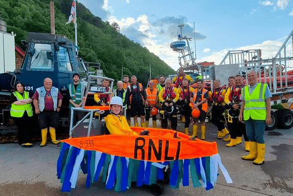 Arlan Sri Paran raising funds at Minehead Lifeboat Station in his hand-built 'Atlantic 85 lifeboat'.