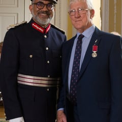Coach crash hero receives his Empire Medal