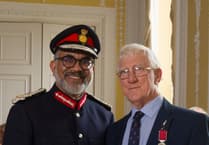 Coach crash hero receives his Empire Medal