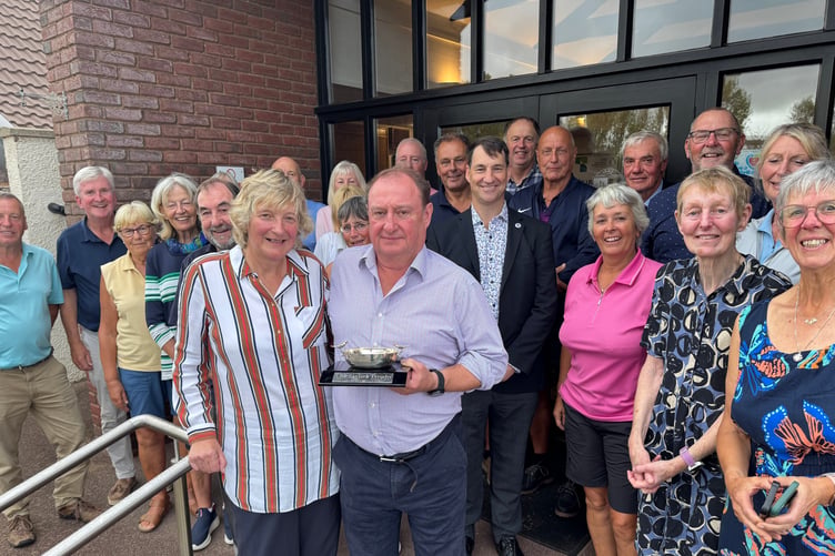 Annette and Richard O'Hare being congratulated by other participants