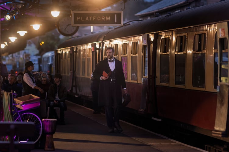 A scene from The Signalman, performed on a Minehead Railway Station platform.