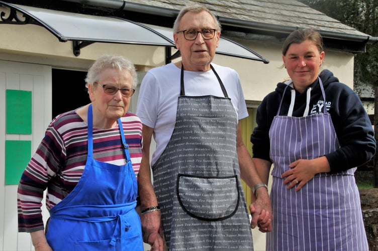 John Goodall pictured with Timberscombe helpers Carol Wheeler and Claire Gibbard in 2021. PHOTO: George Ody.