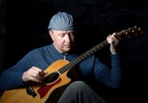 Village pub offers music from local guitarist who has performed for Royalty