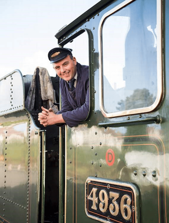Jonathan Jones-Pratt on the footplate of a West Somerset Railway steam engine.