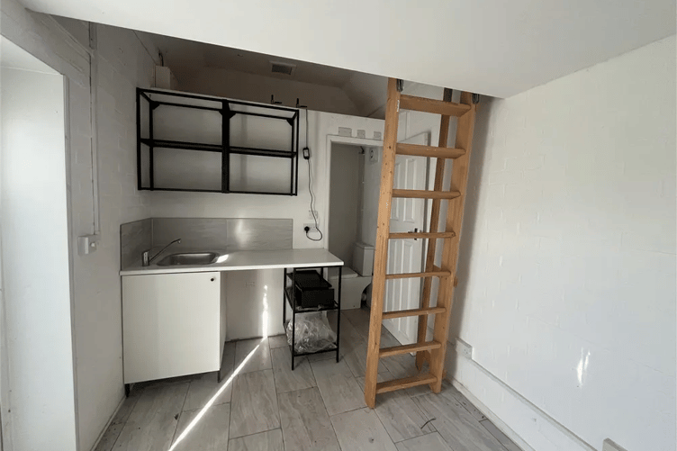 The kitchenette in a former Wiveliscombe BT telephone hut converted to holiday accommodation and now up for sale. PHOTO: Stags.