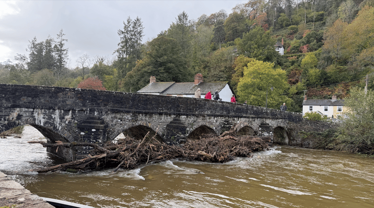 Only two of the five arches of the bridge over the River Barle in Dulverton remained clear of debris.
