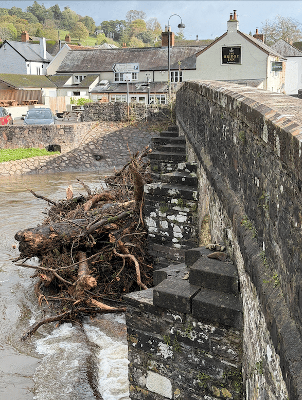 Debris can be seen collecting against Dulverton's bridge over the River Barle.