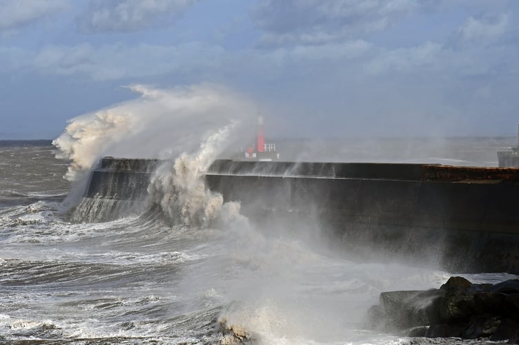 Storm Austen lashes Watchet Harbour on Friday evening.