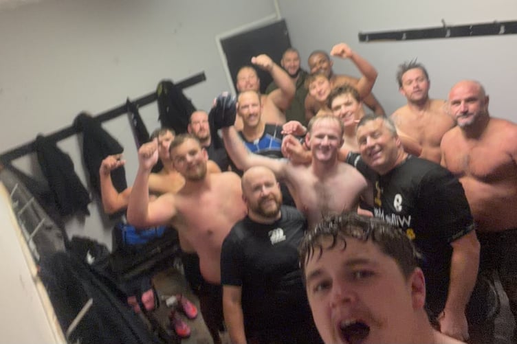 Minehead Seconds celebrate their rugby win at Hornets